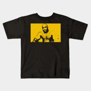 Barry Wood - Large Black Man in Yellow Kids T-Shirt